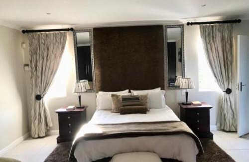 Bluewater Bay Bed & Breakfast | Discover Amani Luxe Villa: 4-Star Poolside Retreat