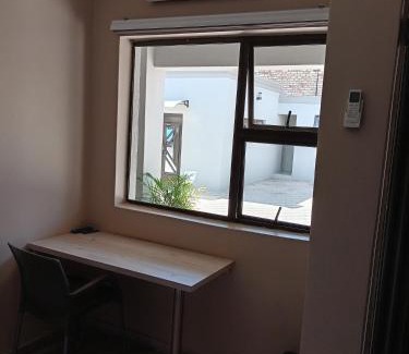 Klerksdorp House | Relax at Amani Palms Guest House with Pool Access