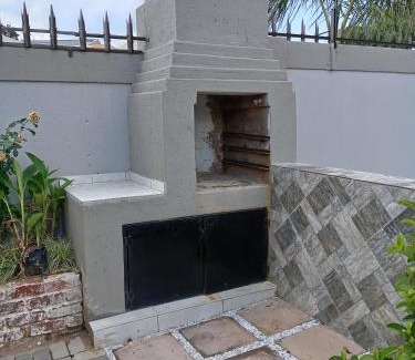 Klerksdorp House | Relax at Amani Palms Guest House with Pool Access