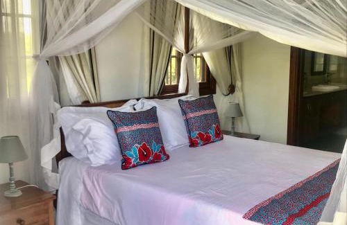 Arusha Hotel | Discover Amani Villa: Family-Friendly Stay with Pool & Dining