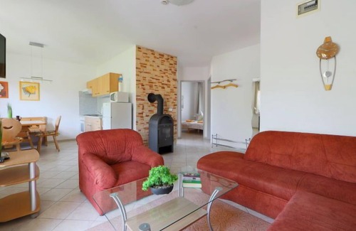 Balatonmariafurdo Apartment | Inviting Amarillo 2 with Oceanfront Pool and Spa Amenities