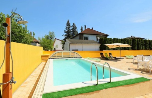Balatonmariafurdo Apartment | Experience Amarillo 3 by Interhome: Poolside Paradise Awaits