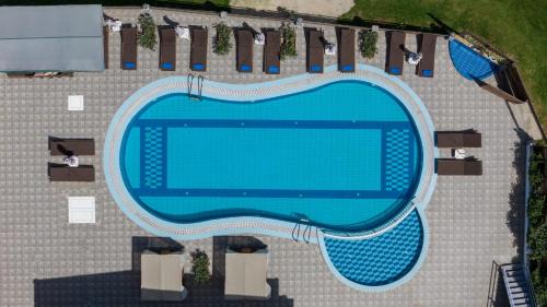 Amoudi Apartment | Beachfront Bliss at Amarylis Studios with Ocean Views