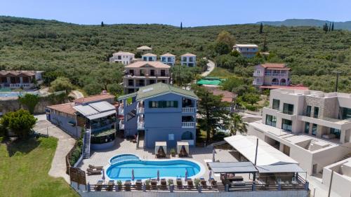 Amoudi Apartment | Beachfront Bliss at Amarylis Studios with Ocean Views