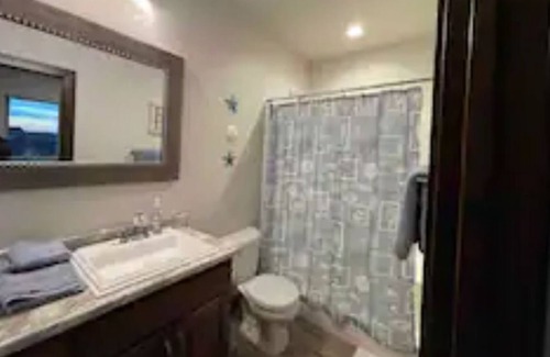 Arnolds Park Condo | Impressive 4 BR Condo with Lake View & Two Master Suites