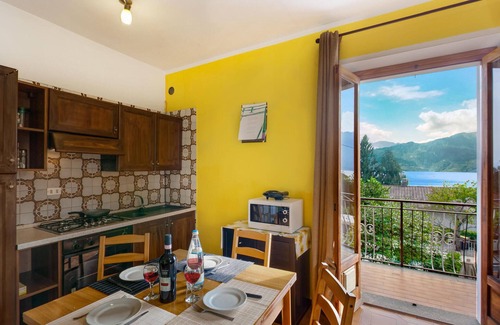 Suna Apartment | Relaxing 2-Bedroom Retreat with Pool and Lake View
