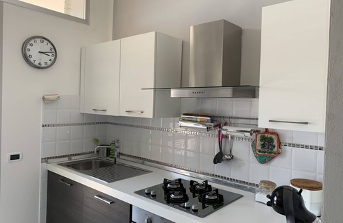 Follonica Apartment | Cozy Beachfront Apartment with Ocean View & Breakfast
