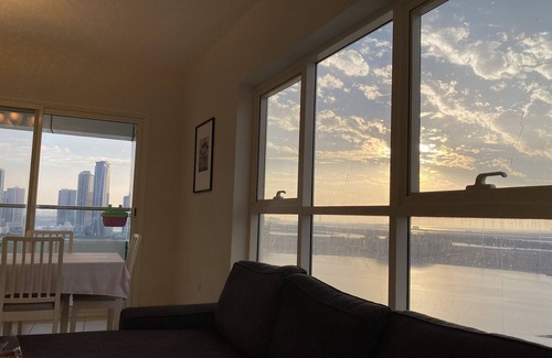Al Majaz Apartment | Beachfront Bliss: 5-Star Fully Furnished Retreat