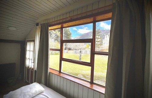 Colonia Suiza Ski Chalet | Inviting Cabin with Ocean View at Lake Moreno H58