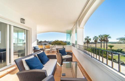 Roldan Apartment | Stunning Golf Views Apartment with Pool & Child-Friendly Access