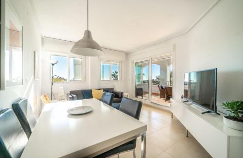 Roldan Apartment | Stunning Golf Views Apartment with Pool & Child-Friendly Access