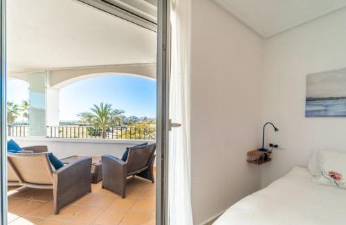 Roldan Apartment | Stunning Golf Views Apartment with Pool & Child-Friendly Access