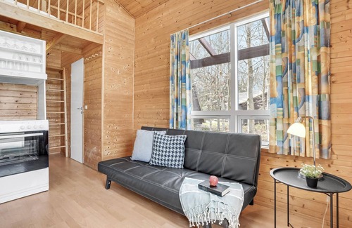 Fredericia House | Family-Friendly Beachfront Log Cabin with Pool & Spa Amenities