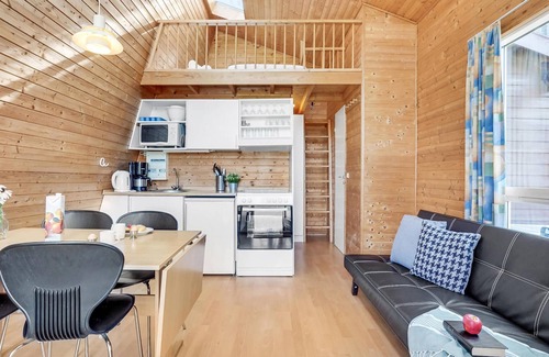 Fredericia House | Family-Friendly Beachfront Log Cabin with Pool & Spa Amenities