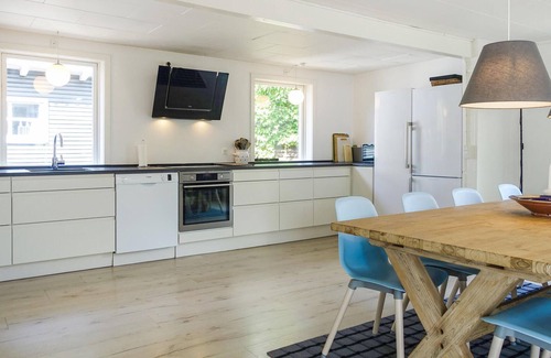 Balka Strand House | Charming 1950s Beach Home Steps from Balka's Scenic Shore