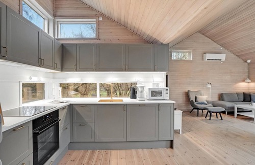 Bøtø By House | Charming 4-Bedroom Retreat in Væggerløse with Ocean Views