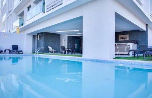 Evaristo Morales Apartment | Exclusive 1BR Retreat with Infinity Pool & Gym Access