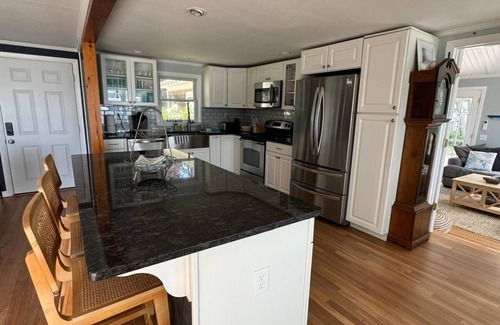 Dennis Port Cottage | Perfect Lakefront Retreat with Private Dock and Hot Tub