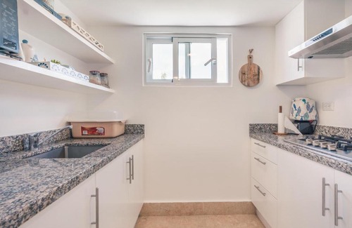 Munoz Apartment | Top-Rated 1 BR Property at Green One with Pool Access