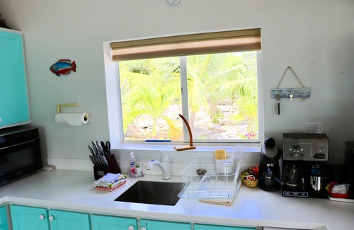 George Town House | Idyllic Guest House with Private Beach, Dock & Gym