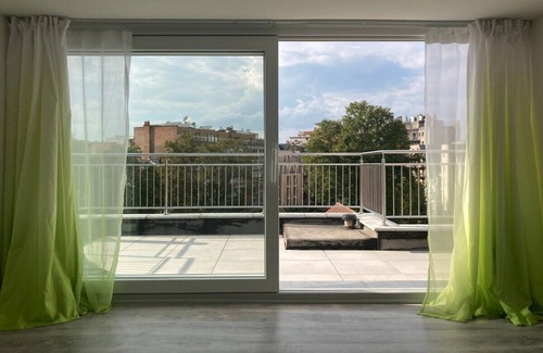 Wijk van de Squares Apartment | Inviting Rooftop Apartment in Brussels - Fantasy Land Retreat