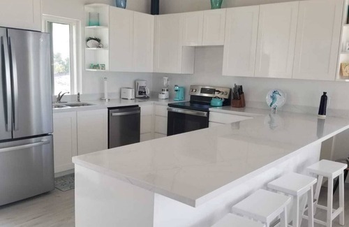 Long Bay Hills Villa | Unforgettable Sunsets Just Steps from the Beach