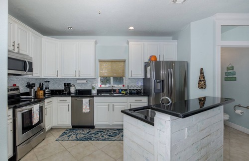 Bay Esplanade House | Top-Rated Townhome with Rooftop Hot Tub and Ocean Views