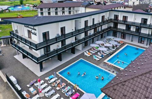 Solotvyno Hotel | Relax at Ambassador: Oceanfront Escape with Pool Access