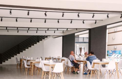 Solotvyno Hotel | Relax at Ambassador: Oceanfront Escape with Pool Access