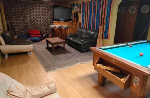 Argenteuil House | Relax at Ambiance Bar: Family-Friendly with Pool Access