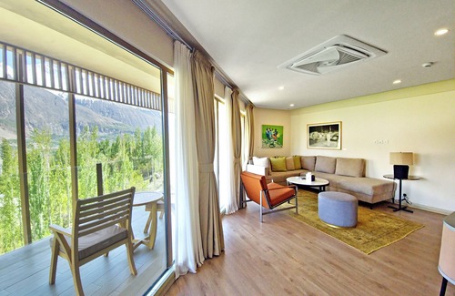 Hunza Hotel | Discover Ambiance Resort Hunza: Poolside Retreat Awaits