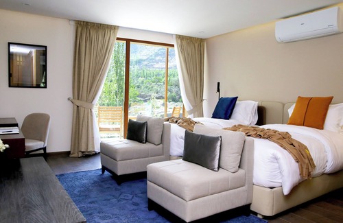 Hunza Hotel | Discover Ambiance Resort Hunza: Poolside Retreat Awaits
