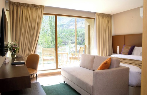 Hunza Hotel | Discover Ambiance Resort Hunza: Poolside Retreat Awaits