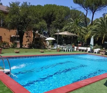 Rome Province Bed & Breakfast | Comfortable Stay at AmbraBed Lunghezza Station with Pool