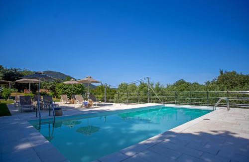 Perama Apartment | Experience AMD House: Oceanfront Retreat with Pool Access