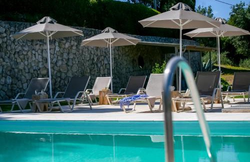 Perama Apartment | Experience AMD House: Oceanfront Retreat with Pool Access