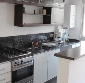 Colegiales Apartment | Inviting Amenabar Suites: Family-Friendly with Pool Access