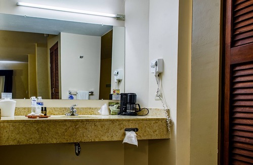 Delicias Hotel | Guest Rated: American Inn Hotel & Suites Delicias Awaits