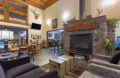 Black River Falls Hotel | Discover AmericInn by Wyndham: ATV Trail & Family Amenities