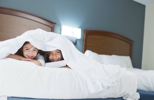 Black River Falls Hotel | Discover AmericInn by Wyndham: ATV Trail & Family Amenities
