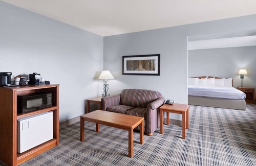 Stuart Hotel | Family-Friendly AmericInn by Wyndham Stuart with Pool & More