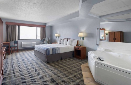 Stuart Hotel | Family-Friendly AmericInn by Wyndham Stuart with Pool & More