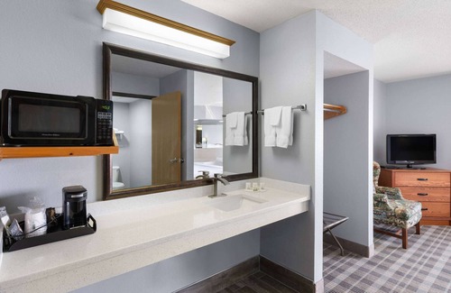 Stuart Hotel | Family-Friendly AmericInn by Wyndham Stuart with Pool & More