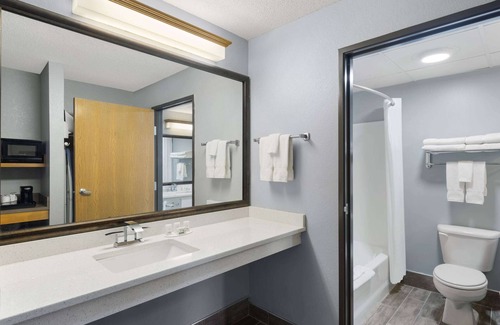 Stuart Hotel | Family-Friendly AmericInn by Wyndham Stuart with Pool & More