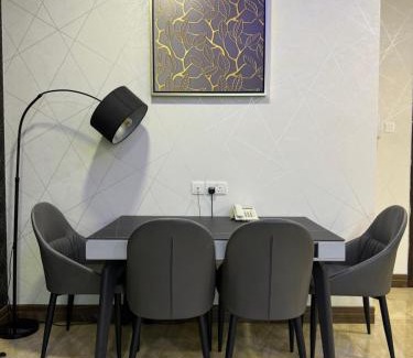 Manama Apartment | Explore Comfort at Amfas Suites: Pool & Breakfast Included