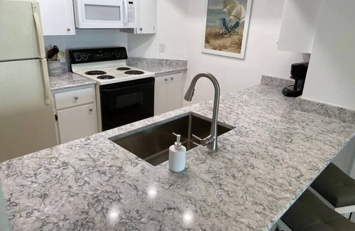 Bradenton Beach Condo | Unwind at AMI Sunset View Retreat - Pet-Friendly Escape