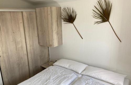 Wassenberg Cabin | Explore Amici Camping at Effelder Waldsee with Ocean Views