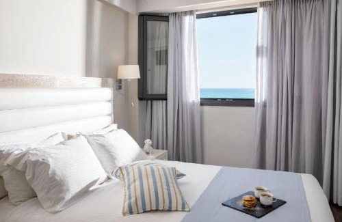 Rethymno Hotel | Escape to Ammos Suites: Oceanfront Bliss with Pool Access