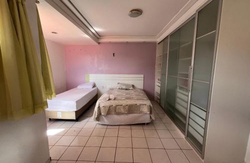 Teresina House | Ideal Duplex House with 4 Suites and Hot Tub Retreat