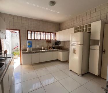 Teresina House | Ideal Duplex House with 4 Suites and Hot Tub Retreat